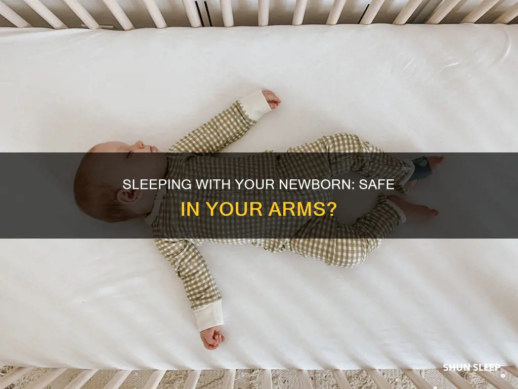 can i sleep with my newborn in my arms