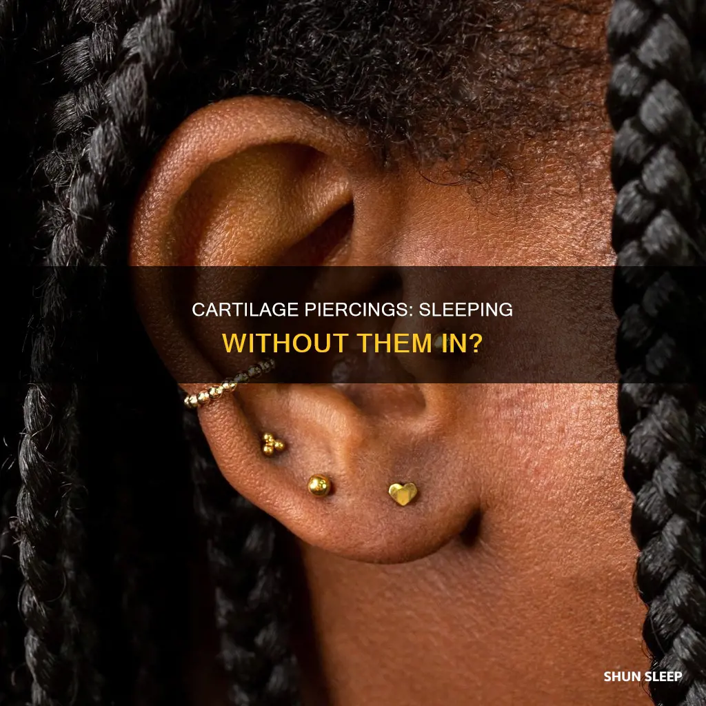 can i sleep without my cartilage piercing in
