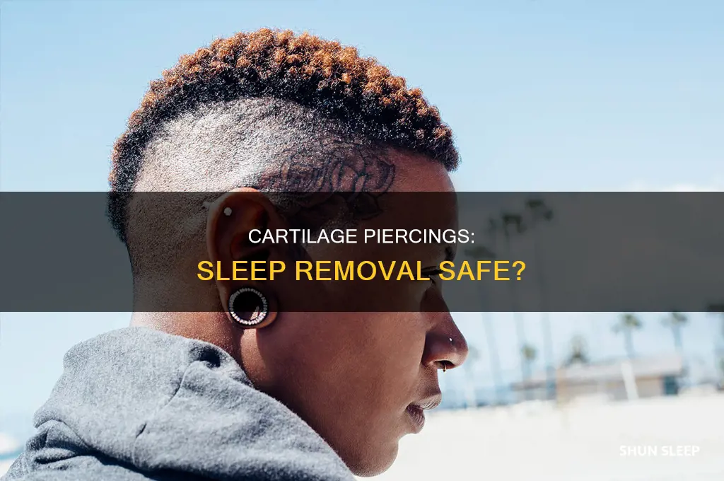 can i take my cartilage piercing out to sleep