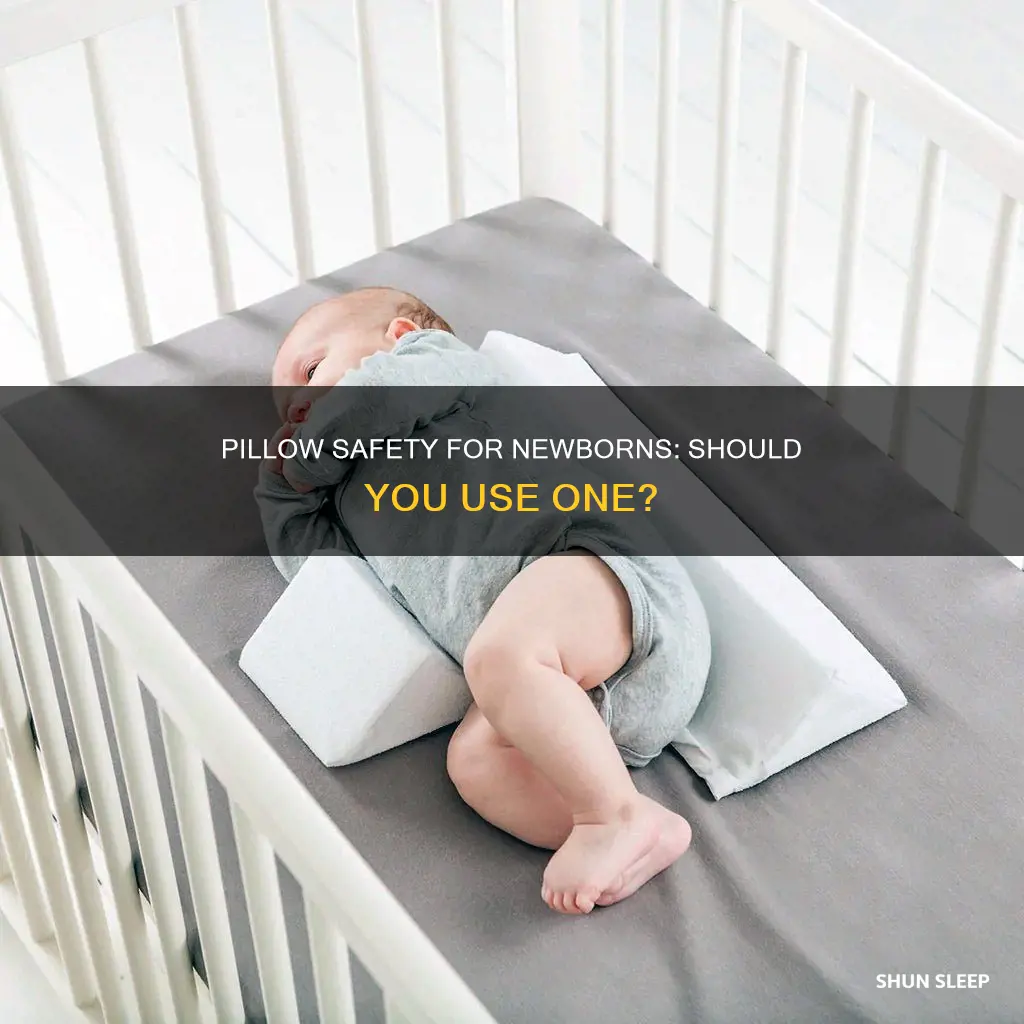 can newborn sleep on pillow