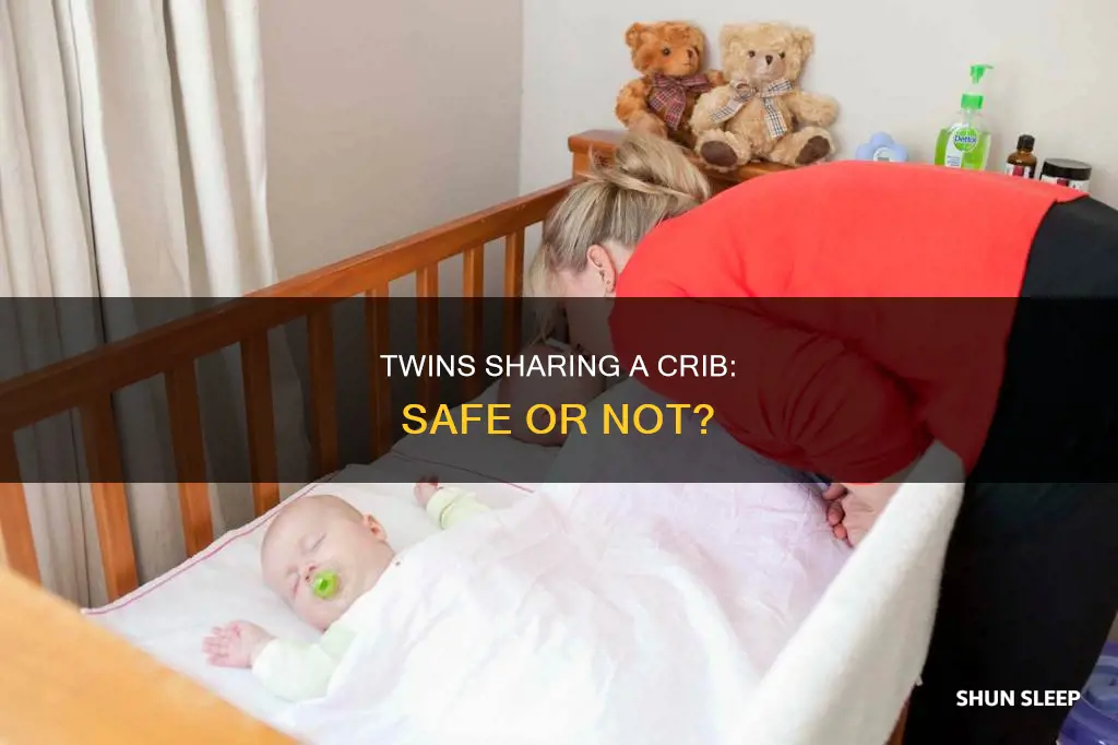 can newborn twins sleep in the same crib