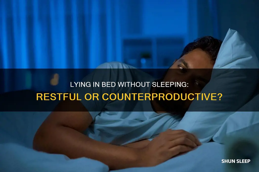 does lying in bed without sleeping help