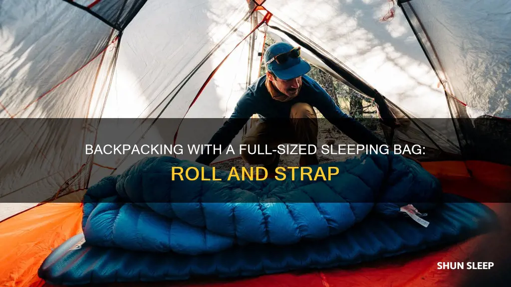 how to backpacking with full sized sleeping bag