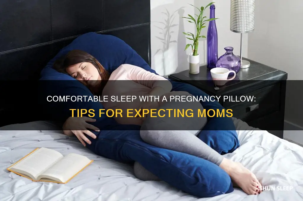 how to get comfortable sleeping with ooogle while pregnant