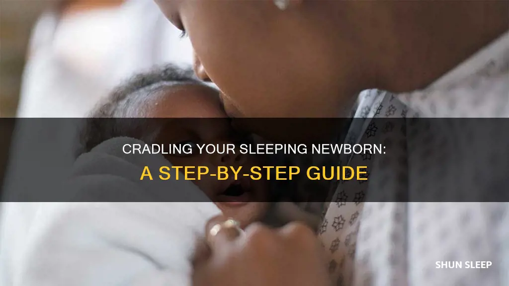 how to hold sleeping newborn