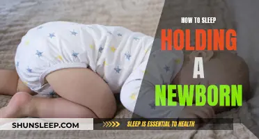 Holding Newborns While Sleeping: A Guide for New Parents