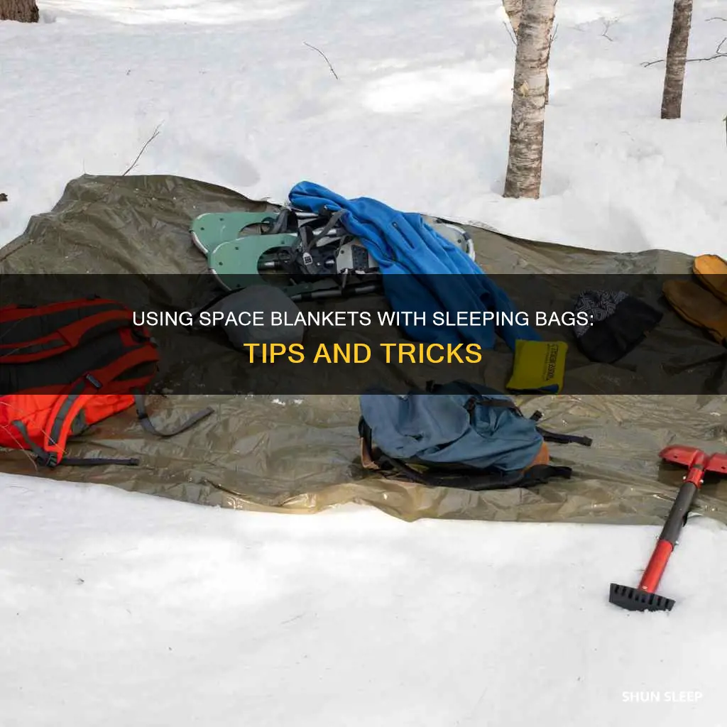 how to use a space blanket with a sleeping bag
