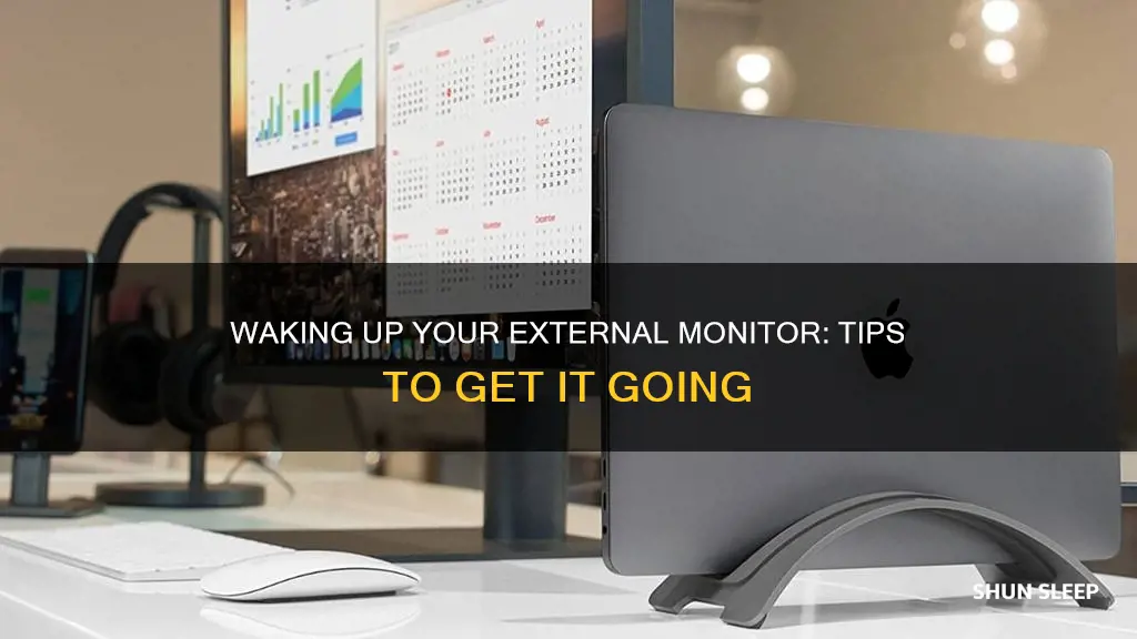 how to wake up sleeping external monitor