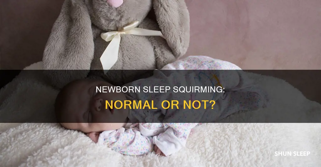 is it normal for newborns to squirm in their sleep