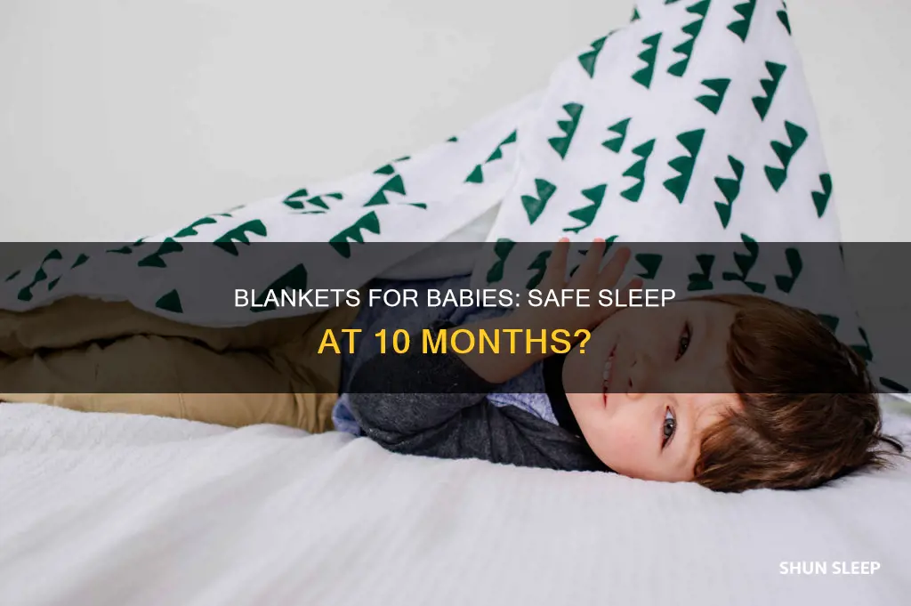 should a 10 month old sleep with a blanket