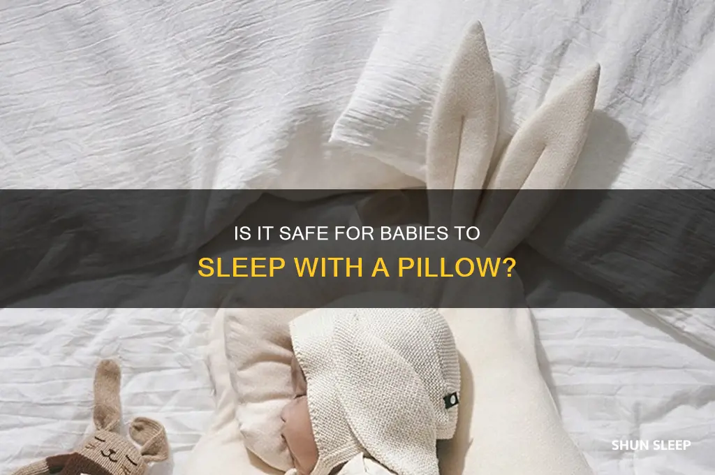 should a baby sleep with a pillow