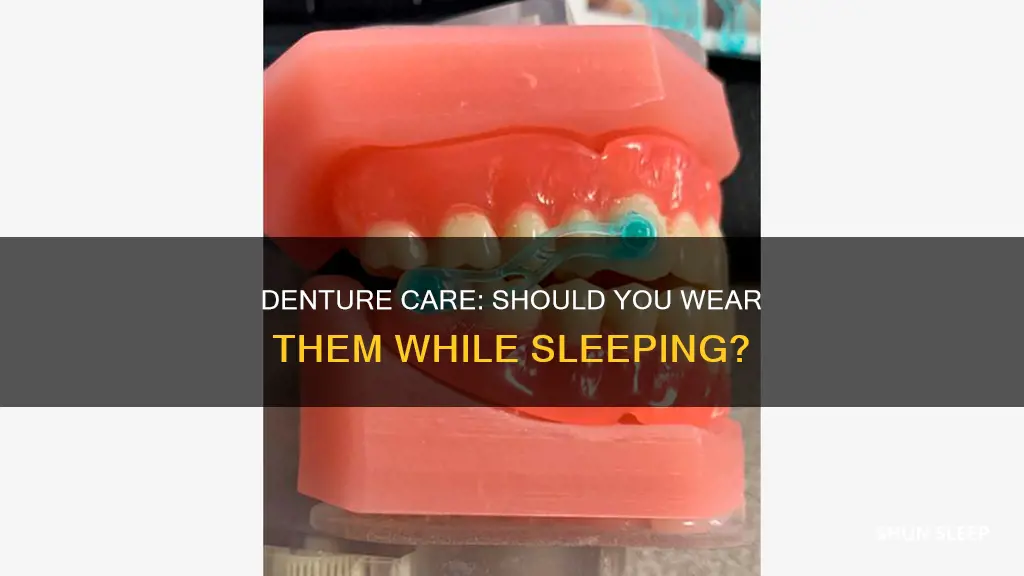 should i wear my dentures to sleep day after