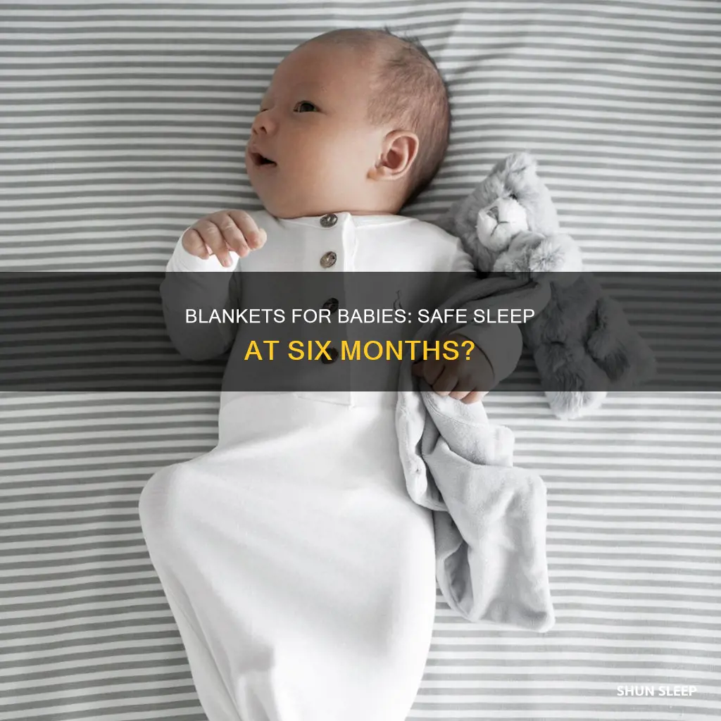 should my 6 month old sleep with a blanket