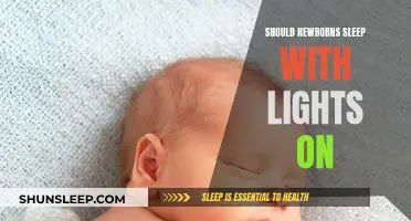 Lights Out for Newborns: To Sleep With or Without?