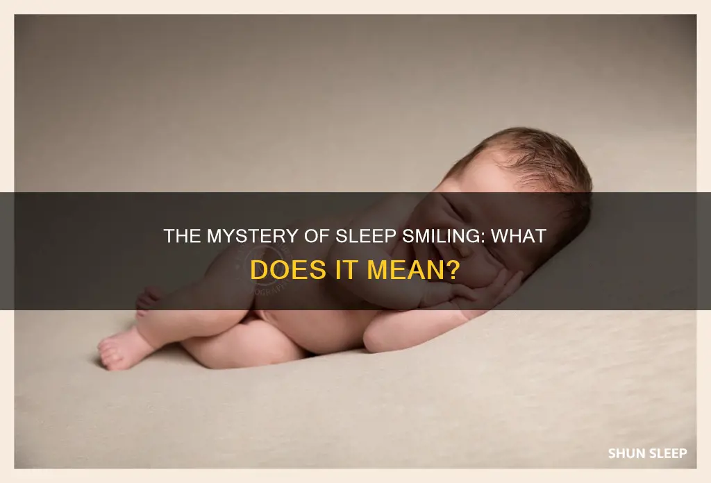 what does it mean if you smile in your sleep