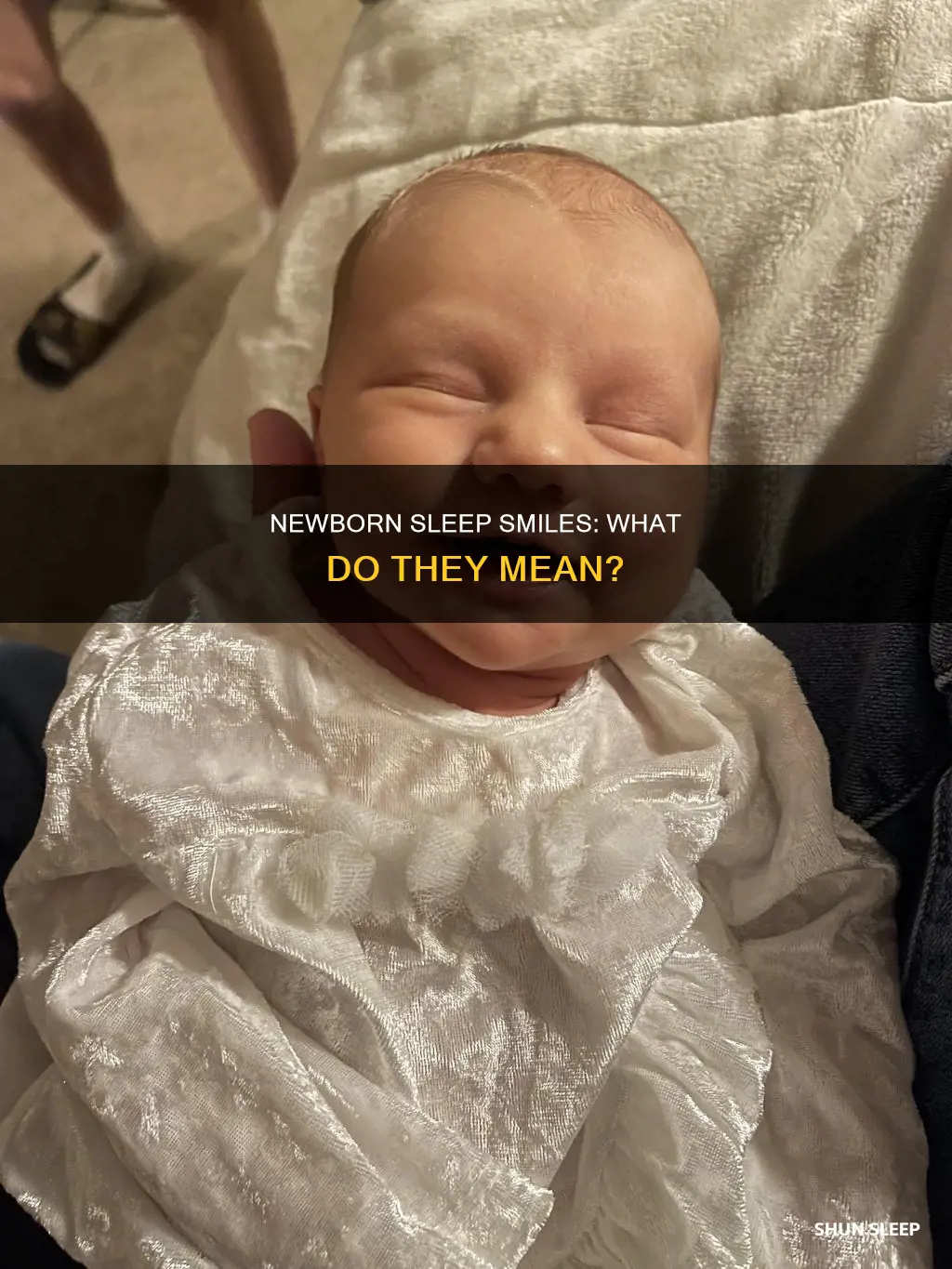what does it mean when newborns smile in their sleep