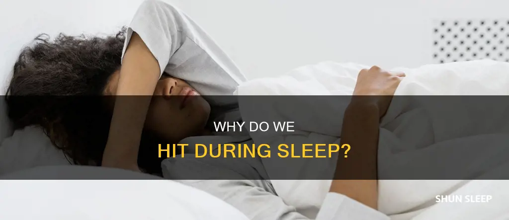 what does it mean when you hit in your sleep