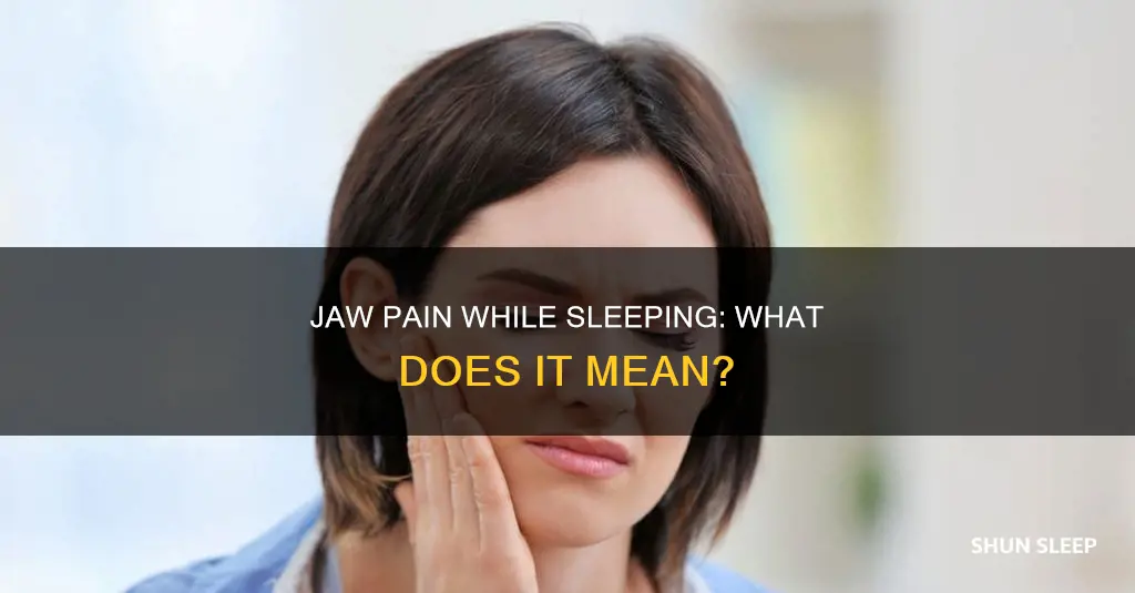 what does jaw pain while sleeping mean