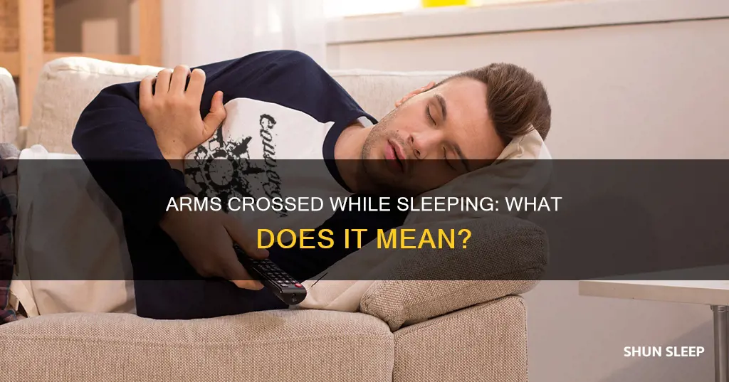 what does sleeping with arms crossed mean