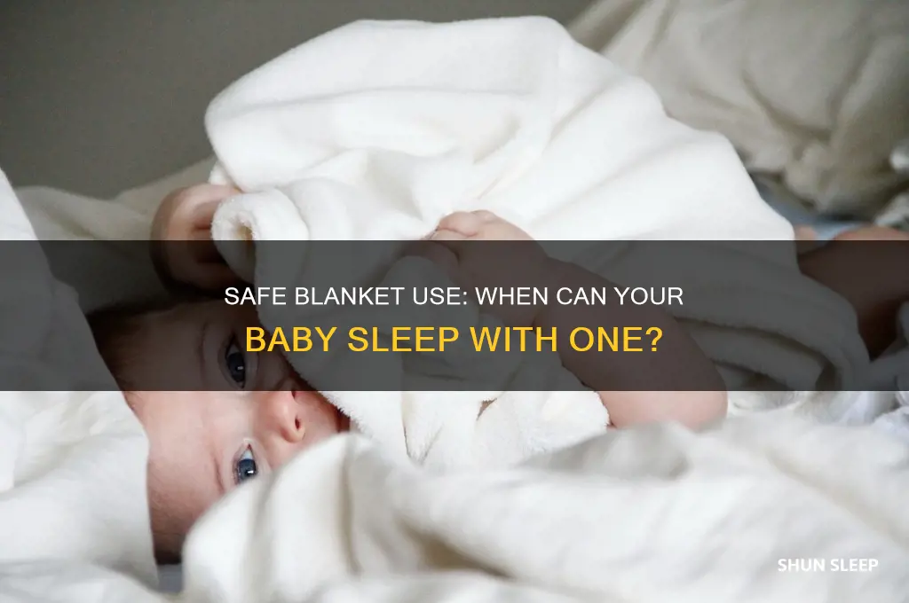 when can baby start sleeping with blanket