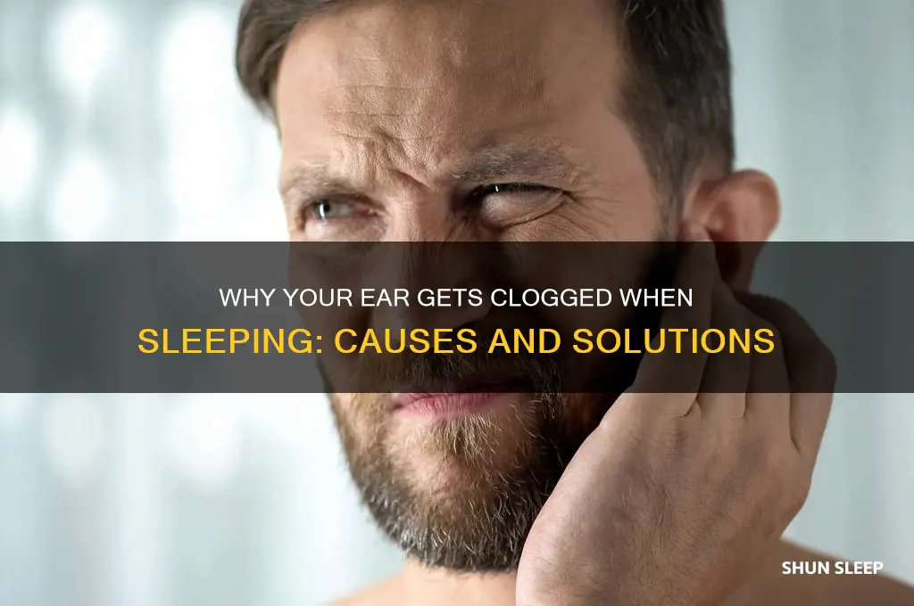 when i sleep my ear gets clogged