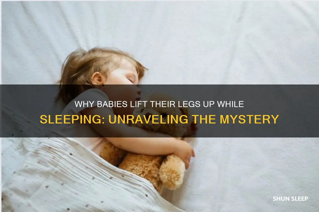 why do babies lift their legs up while sleeping