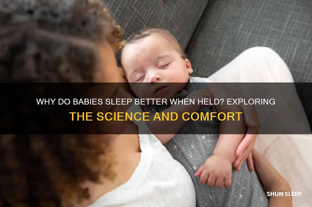 why do babies sleep better being held