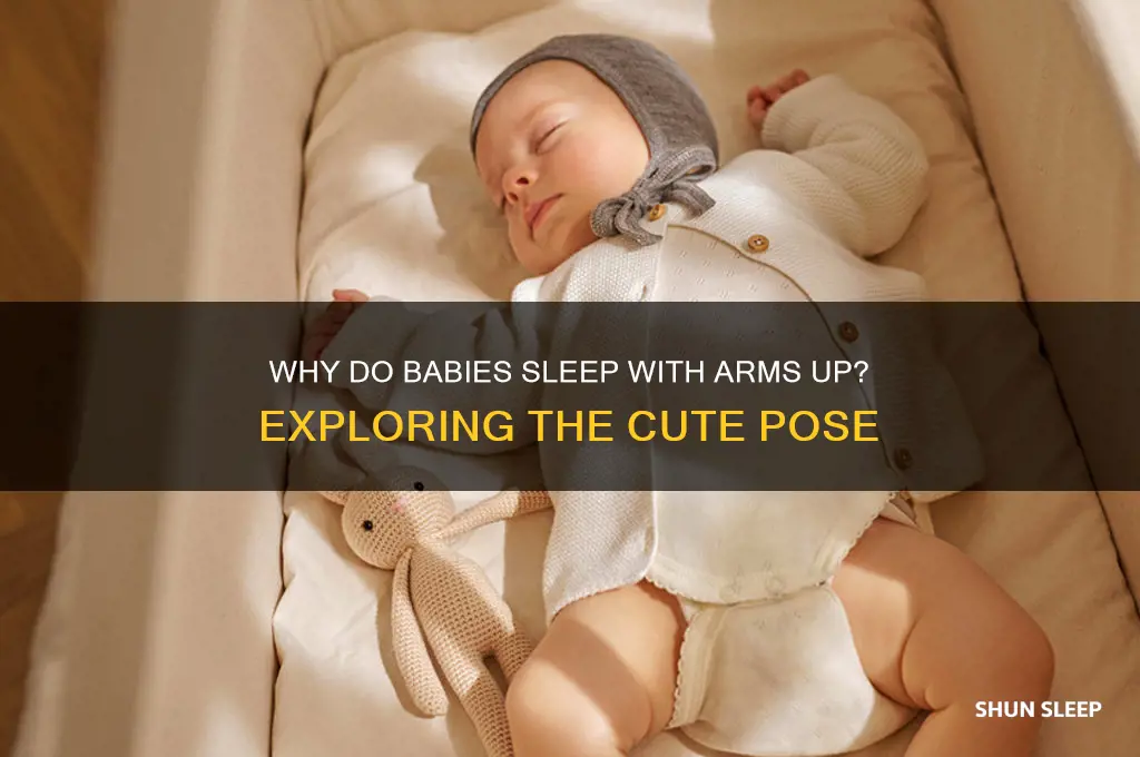 why do babies sleep with arms in the air