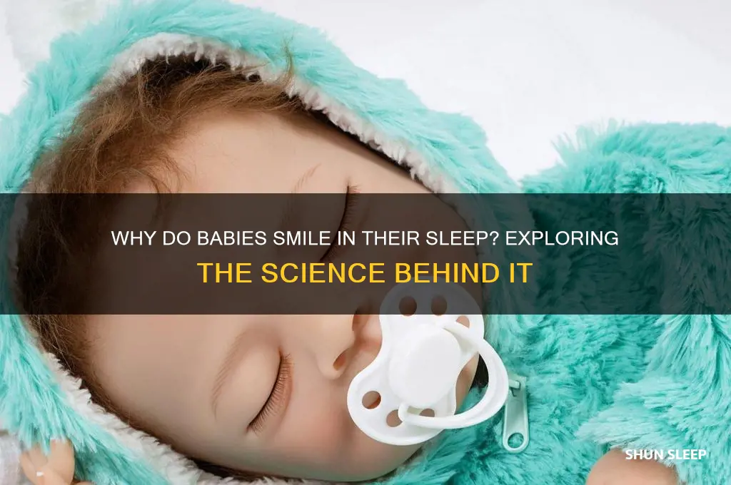 why do babies smile in their sleep