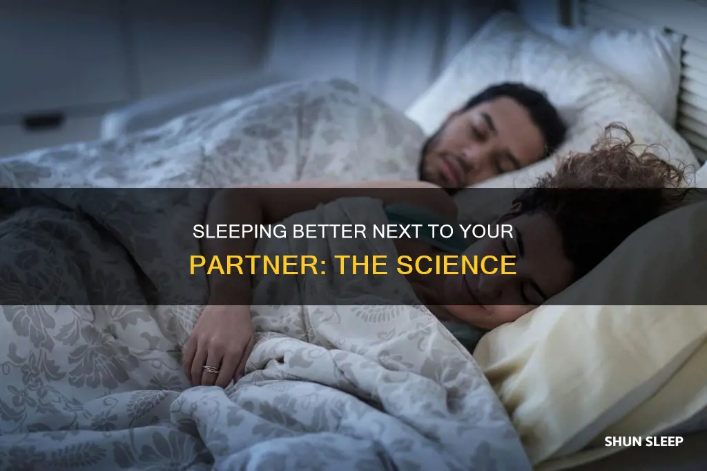 why do i sleep better next to my partner