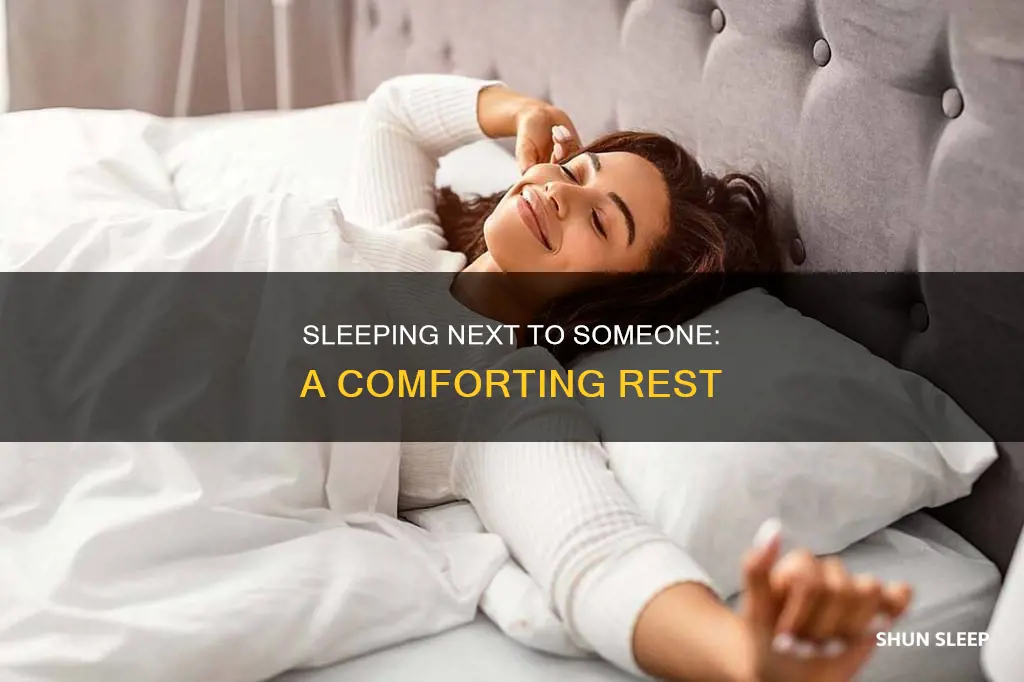 why do i sleep better next to someone
