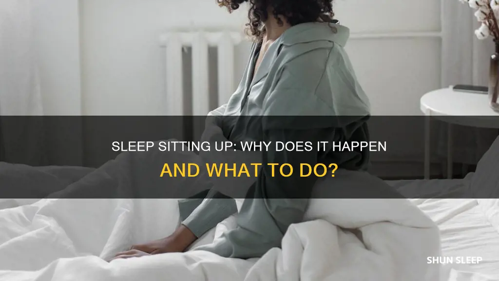 why do i wake up sleeping sitting up