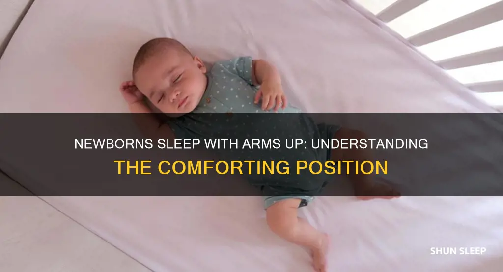 why do newborns sleep with their arms up