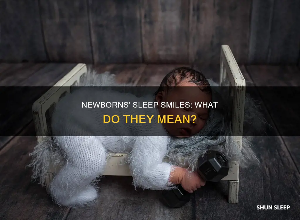 why do newborns smile in sleep