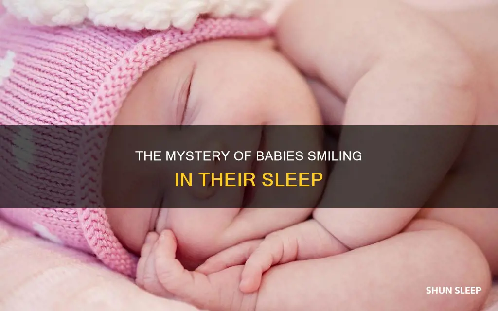 why does my 6 month old smile in his sleep