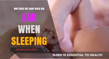Why Babies Hold Their Ears While Sleeping: Causes and Solutions