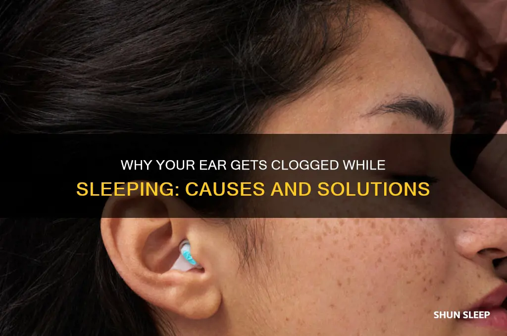 why does my ear get clogged when sleeping