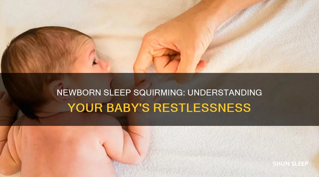 why does my newborn squirm in her sleep