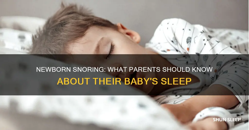why is my newborn snoring while sleeping