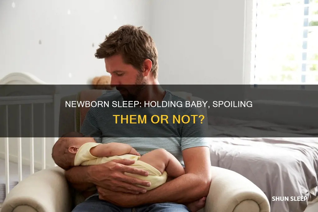 will holding a newborn while it sleeps spoil it