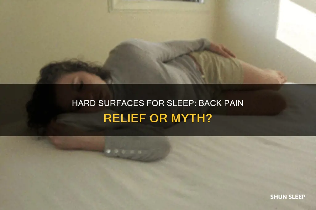 will sleeping on a hard flat surface help back